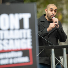 Man speaks into microphone 