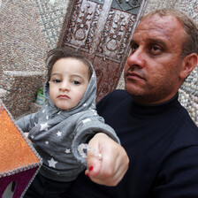 Man holds a child. 