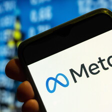 The Meta logo is seen on a mobile phone