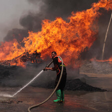 Firefighters tackle a blaze