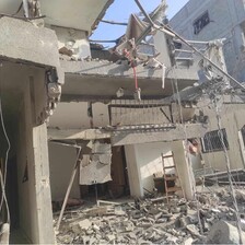 A home destroyed by an Israeli airstrike is missing walls and windows