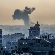 Smoke from an explosion rises above residential buildings in the southern Gaza city of Rafah 