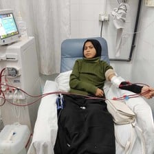 A patient is connected to a dialysis machine in a Gaza hospital 