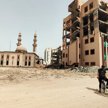 Two large structures with burnt-out and hollowed black windows