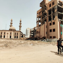 Two large structures with burnt-out and hollowed black windows