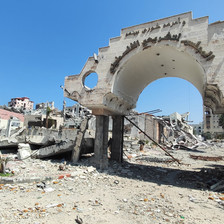 the rubble of demolished buildings in what remains of Gaza CIty