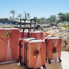 Four pink suitcases