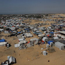 An aerial view of many makeshift tents in the sands of southern Gaza