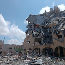 A bomb damaged building stands in ruins