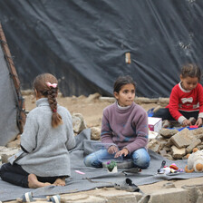 Children play on the ground. 