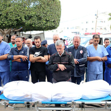 doctors perform funeral rites for a colleague