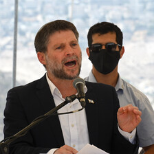 A man speaks into a microphone