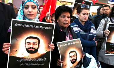 Shireen Issawi (left) at a Ramallah protest in support of her brother Samer