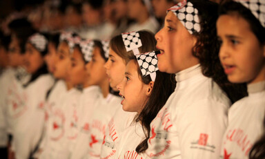 Close-up of girls singing