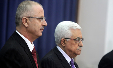 Close-up of profiles of Dr. Rami Hamdallah and Mahmoud Abbas