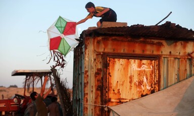 Musa, one Flying Paper's main characters, rescuing a kite.