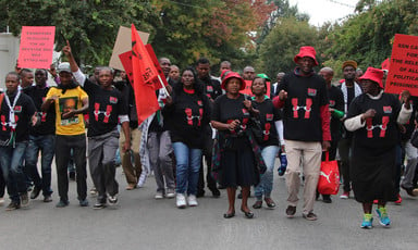 Activists march on the Johannesbourg offices of the Bill and Melinda Gates Foundation