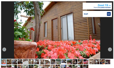 Screenshot of Ramot hotel listing shows cabin-style building
