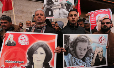 Protesters holding posters of Khalida Jarrar and Ahed Tamimi to show solidarity with Palestinian prisoners held in Israeli jails. 