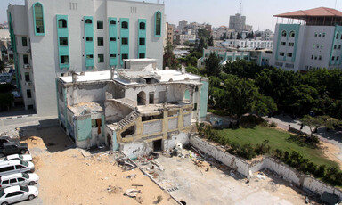 Landscape view of badly damaged multi-story building