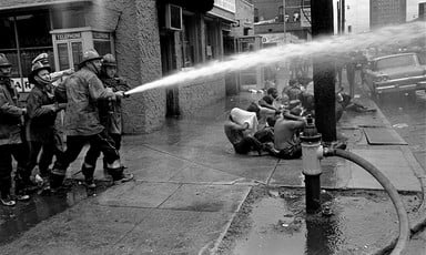 Civil rights protesters blasted by fire hoses.