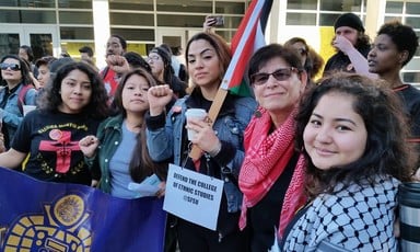 Professor Rabab Abdulhadi stands with student supporters at San Francisco State University.