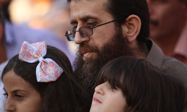 Khader Adnan with two of his children. 