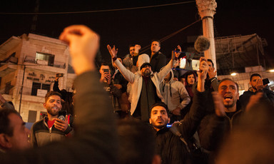 Demonstrators against a new Palestinian social security law chant slogans at Ramallah's central Manara Square