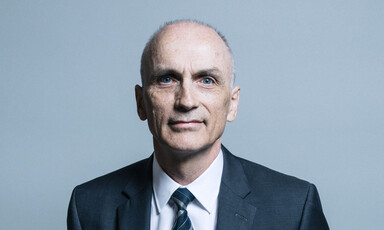 Headshot of man in suit