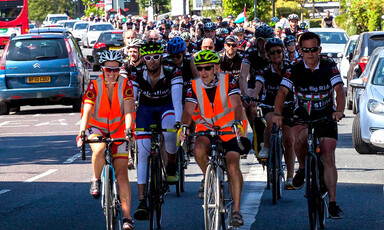 A group of bike riders with Palestine shirts