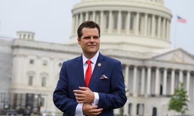 Man poses outside US Capitol Building