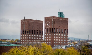 Red brick buildings tower over cityscape