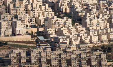 Apartment buildings cover a hillside