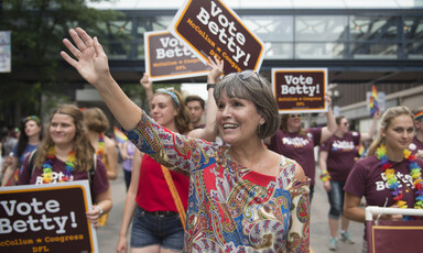 Woman marches in parade