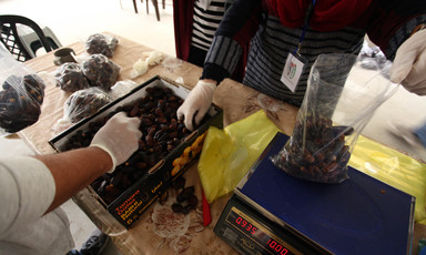 Dates are weighed on a scales