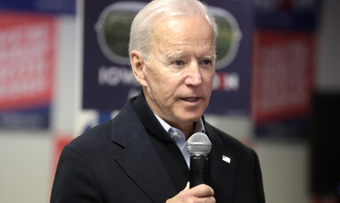 Man holds microphone