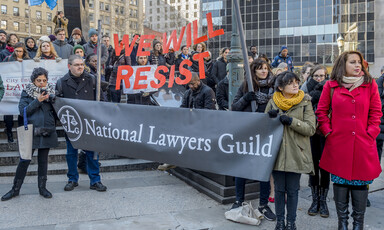 People rally with banners