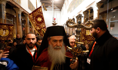 Man dressed in klobuk and long beard