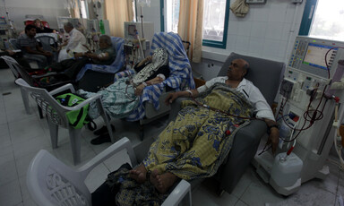 Patients receive dialysis treatment in a hospital room