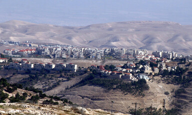 A view of a group of houses on hilltops