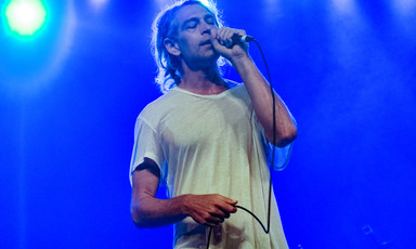 Singing man holding microphone