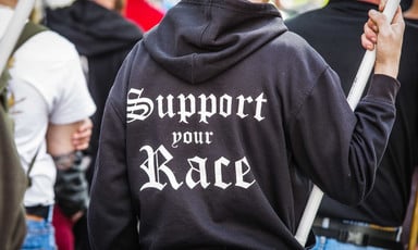 Man wears sweatshirt with racist slogan