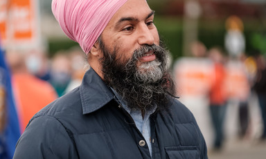 A close-up photo of Jagmeet Singh, seen from chest up, at a rally