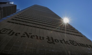 Sun shines behind New York Times building