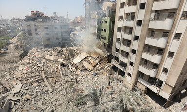 Rubble amid damaged and destroyed buildings