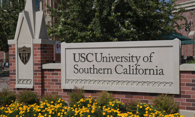 A sign in front of the USC campus