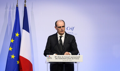 Man in suit at podium