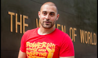 Man wearing red and yellow T-shirt 