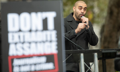 Man speaks into microphone 