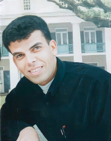Man wearing a dark shirt